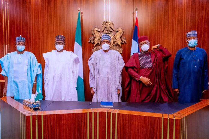 President Buhari (middle), Femi Fani-Kayode (2nd right) with other APC bigwigs