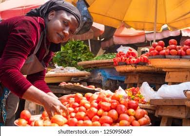 Photo of a food trader at a market