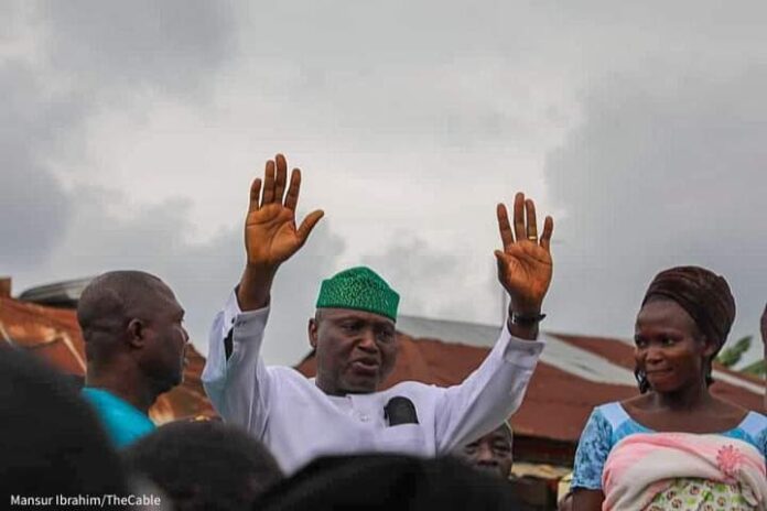 Ekiti state Governor-elect, Biodun Oyebanji, acknowledging cheers from his supporters.