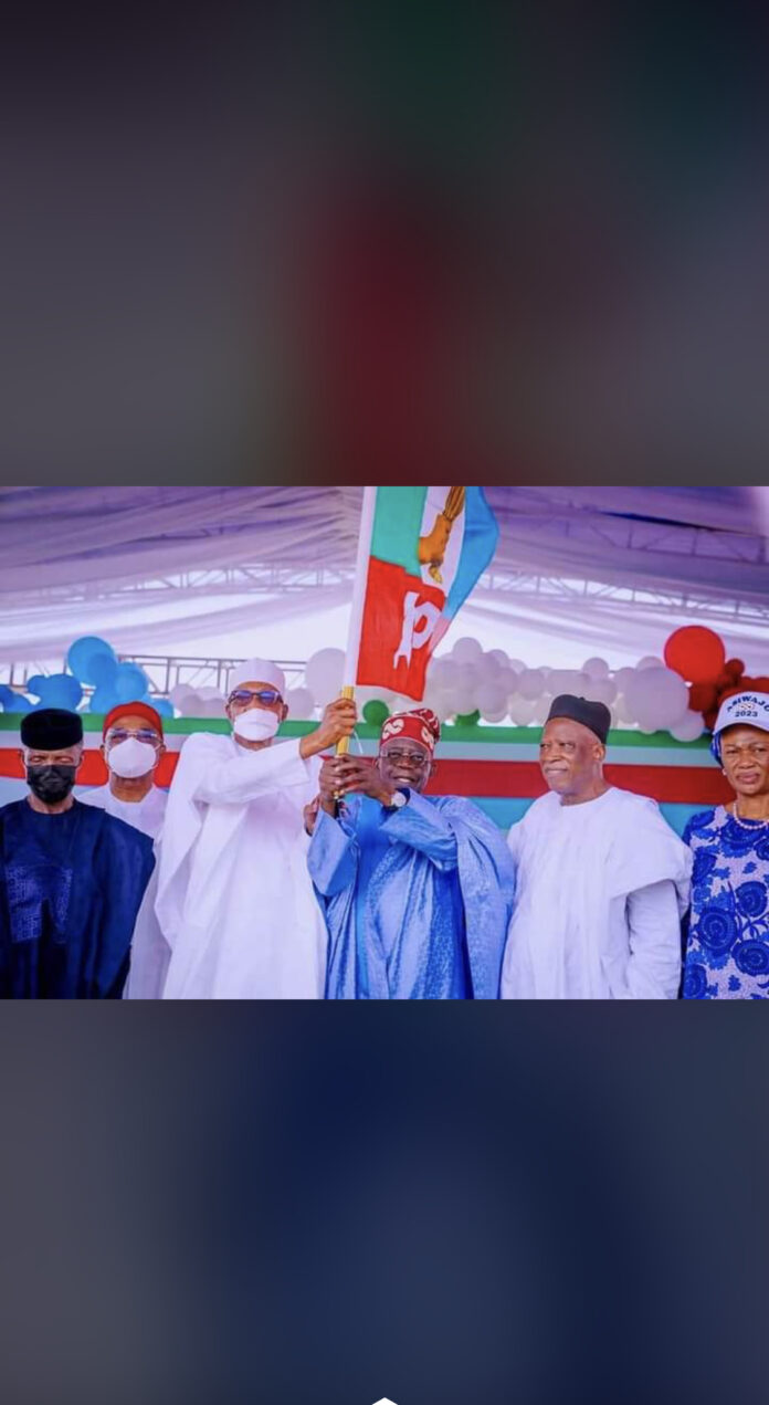 President Muhammadu Buhari presenting APC to winner of the recently concluded Presidential primary at Eagle Square Abuja, Vice President Osibanjo at the left side and APC party chairman Abdullahi Adamu at the right side