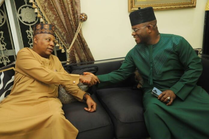 Yahaya Bello shakes hand with Kashim Shettima