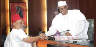 President Muhammadu Buhari Shakes hands with Dr Chris Ngige