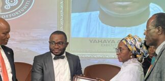 Chief of Staff, Pharmacist Jamiu Abdulkareem Asuku received the Honourary award on behalf of Governor Yahaya Bello