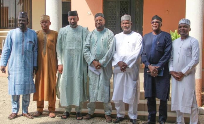 The chairman of the Arewa Economic Renewal Forum (AERF), Ibrahim Shehu Dandakata, flanked by other leaders of the forum with the publisher of PRNigeria, Alhaji Yushau Shuaib (L) and Head of Fact-checking and Investigation at PRNigeria, Mohammed Dahiru Lawal (R) after Tuesday's Press Conference at the PRNigeria Centre in Abuja.