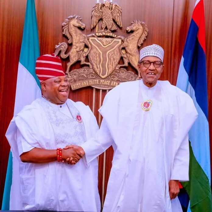 Governor Adeleke (left) with President Buhari in the Villa during his maiden visit