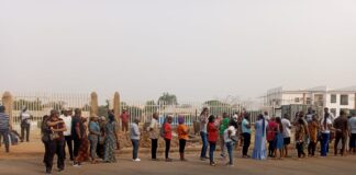 Voters at the Wuye Police Station Polling Unit awaiting the arrival of INEC officials