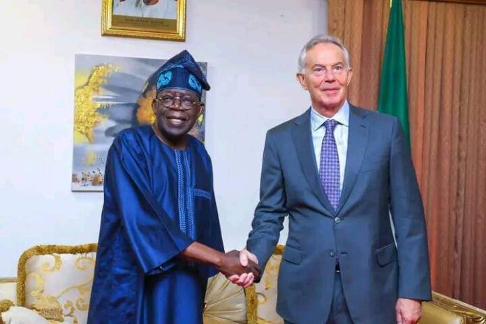Former Prime Minister of the United Kingdom, Tony Blair shakes hand with President-elect, Bola Ahmed Tinubu