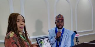 Dr. Josephine Oghale-Abraham receives award from the AYCC