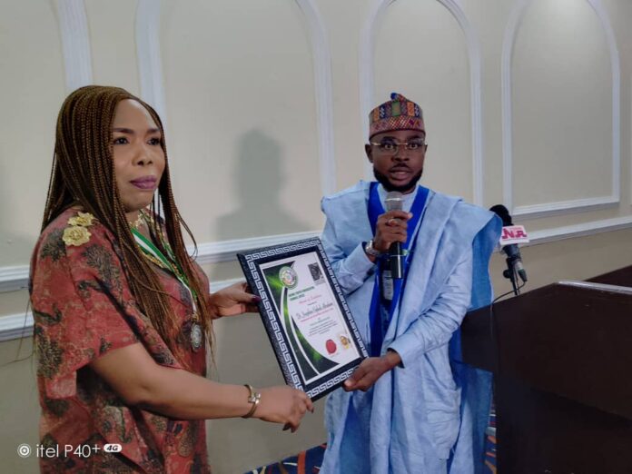 Dr. Josephine Oghale-Abraham receives award from the AYCC
