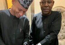 Shettima Comparing his Ring and Wristwatch with that of his Lookalike