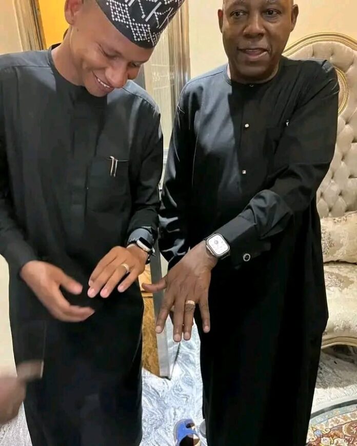 Shettima Comparing his Ring and Wristwatch with that of his Lookalike