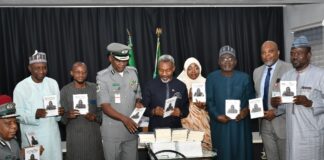 Group photograph with the CG of Custom, CG Bashir Adewale Adeniyi, during the book Presentation