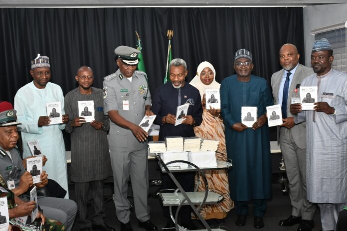 Group photograph with the CG of Custom, CG Bashir Adewale Adeniyi, during the book Presentation