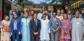 Group photograph with the Chairman CCC, Major General Chris Olukolade (Rtd), the Editor-in-Chief of IMPR, Alh. Yushau Shuaib