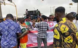 Protesters Clash Over Inclusion of Adeleke’s name is placards