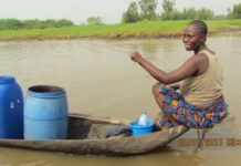 Woman riding a boat