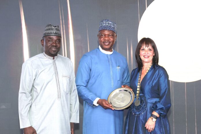 From (L) The Editor-in-chief of Image Merchant Promotion Limited, Alh. Yushau A. Shuaib, CGC Bashir Adewale Adeniyi with President Nataša Pavlović Bujas at the award ceremony