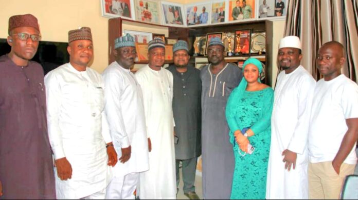 The Interim Chairman of BUK Alumni Association Abuja Chapter, Alhassan Muhammad, (M), Mallam Yushau Shuaib, the Managing Director of IMPR with other members during the courtesy visit.