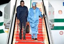President Bola Tinubu with his spokesperson, Bayo Onanuga