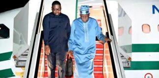 President Bola Tinubu with his spokesperson, Bayo Onanuga